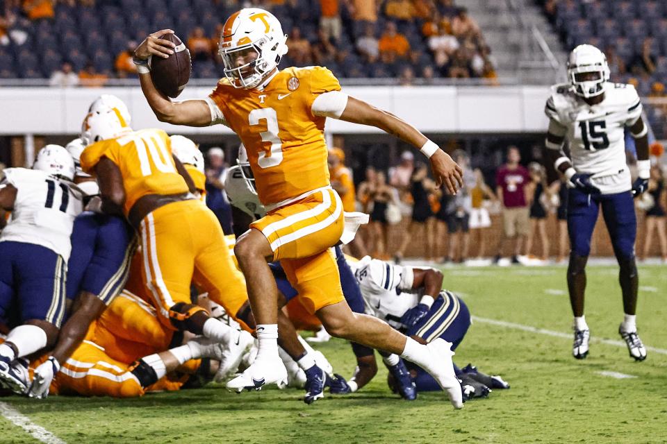 FILE - Then-Tennessee quarterback Tayven Jackson (3) runs for a touchdown during the second half of an NCAA college football game against Akron, Saturday, Sept. 17, 2022, in Knoxville, Tenn. The former Indiana prep star played one season at Tennessee before following his older brother, basketball All-American Trayce Jackson-Davis, to Bloomington. (AP Photo/Wade Payne, File)