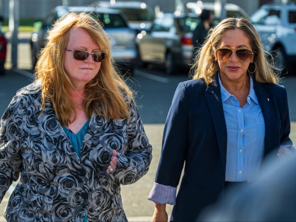 Asa Ellerup, left, the estranged wife of Long Island serial killing suspect Rex Heuermann, arrives at court in Riverhead, New York, on April 24, 2024 (AP)