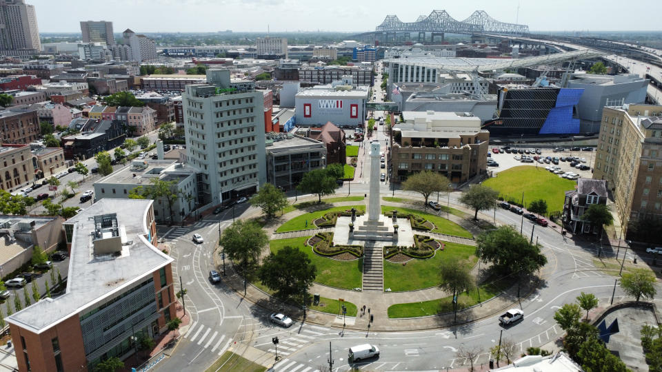 The traffic circle where a statue of Confederate General Robert E. Lee once stood is seen at St. Charles Ave. and Howard Ave. in New Orleans, La., Thursday, April 21, 2022. (Max Becherer/The Times-Picayune/The New Orleans Advocate via AP)