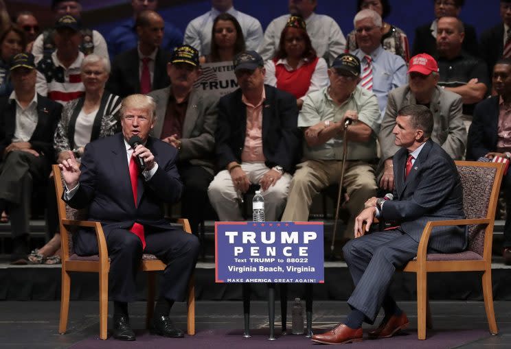 In September of last year, Donald Trump and Michael Flynn speak at a campaign event. (Photo: Alex Wong/Getty Images)