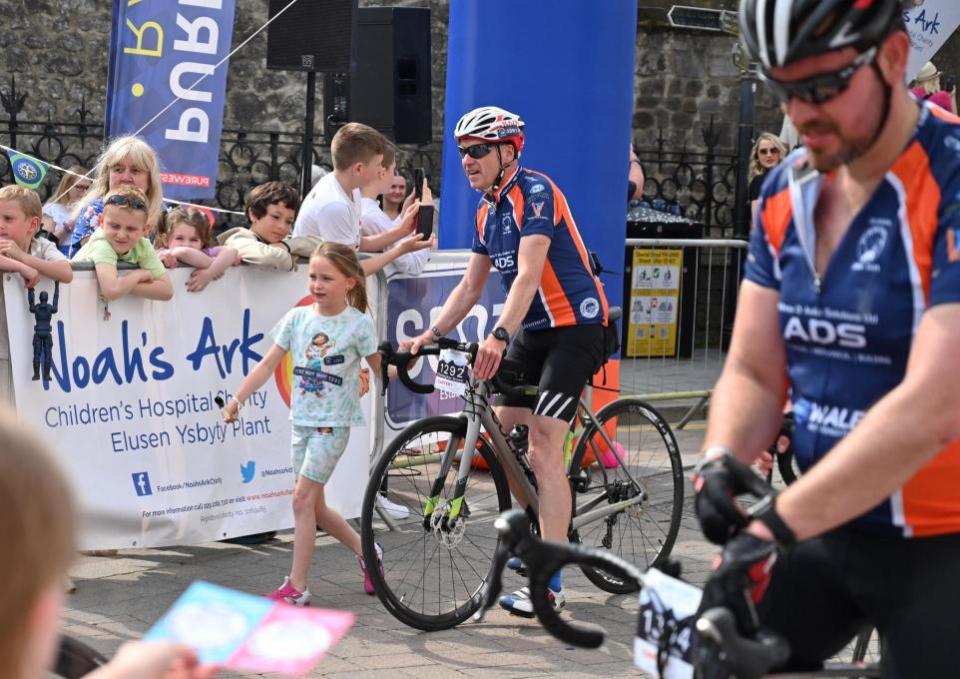 Western Telegraph: The riders were welcomed to Tenby by the charity's supporters.