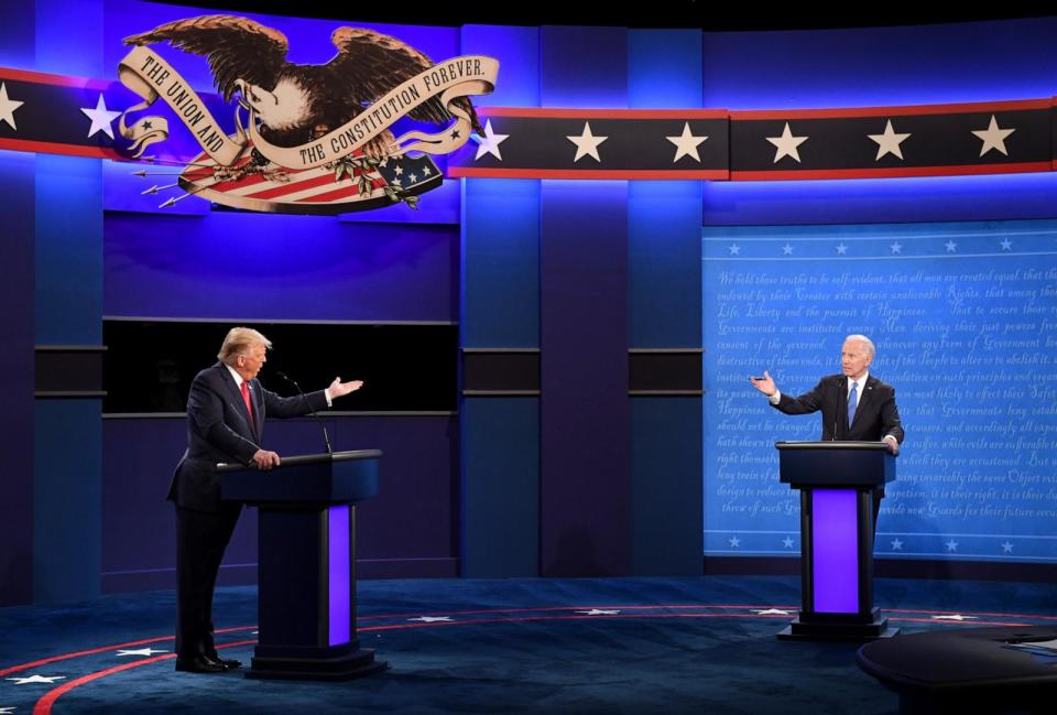 PHOTO: Joe Biden, 2020 Democratic presidential nominee, right, and U.S. President Donald Trump speak during the U.S. presidential debate at Belmont University in Nashville, Tennessee, Oct. 22, 2020. (Kevin Dietsch/UPI/Bloomberg via Getty Images)