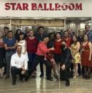 Ming Ma, center, with community members during a dance event in July 2021. (Kristina Hayes via AP)