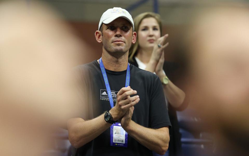 Andrew Richardson, coach of Emma Raducanu of Great Britain, cheers after Raducanu defeated Maria Sakkari of Greece during their Womenâ€™s Singles semifinals match on Day Eleven of the 2021 US Open at the USTA Billie Jean King National Tennis Center on September 09, 2021 - GETTY IMAGES