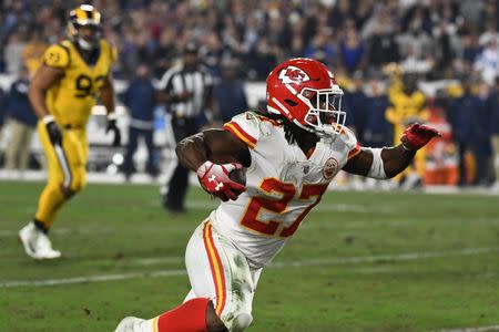 FILE PHOTO - Nov 19, 2018; Los Angeles, CA: Kansas City Chiefs running back Kareem Hunt (27) carries the ball to score in the second quarter against the Los Angeles Rams at the Los Angeles Memorial Coliseum. Mandatory Credit: Robert Hanashiro-USA TODAY Sports