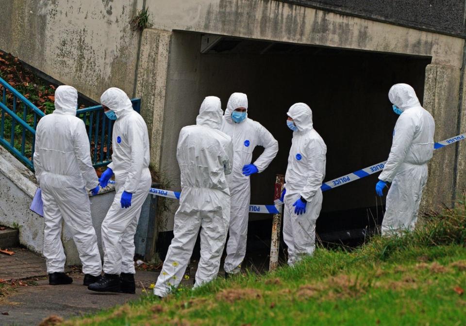 Crime scene investigators near Sheepstor Road in Plymouth, after the body of a woman was found (Ben Birchall/PA) (PA Wire)