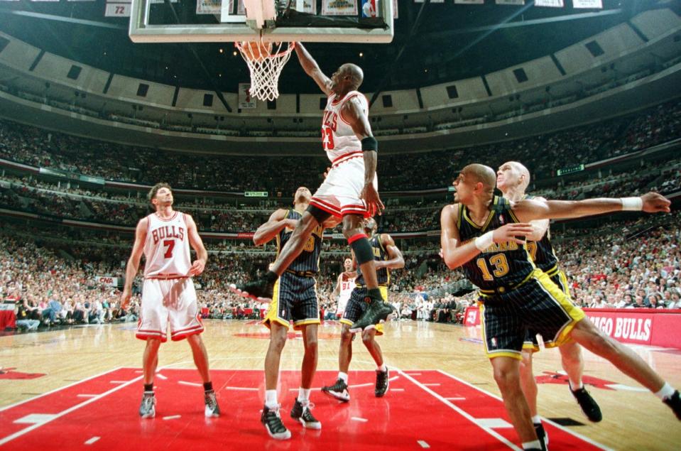 Chicago Bulls Michael Jordan dunks for two against the Indiana Pacers during Game One of the Eastern Conference Finals Sunday, May 17, 1998, at the United Center in Chicago. (AP Photo/Beth A. Keiser)
