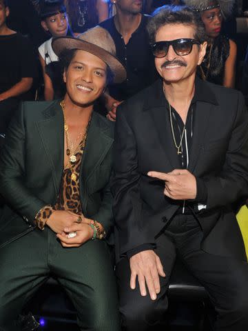 <p>Kevin Mazur/WireImage </p> Bruno Mars and his father Peter Hernandez attend the 2013 MTV Video Music Awards on August 25, 2013.