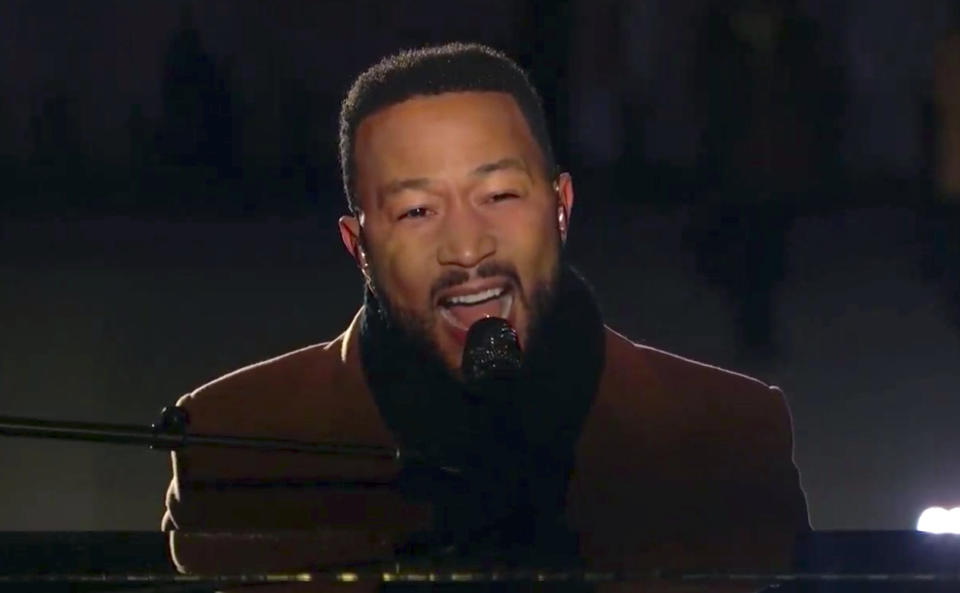 In this image from video, John Legend performs during the Celebrating America event on Wednesday, Jan. 20, 2021, following the inauguration of Joe Biden as the 46th president of the United States. (Biden Inaugural Committee via AP)