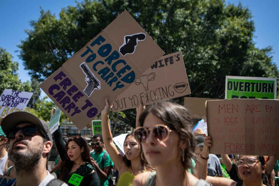 People march in downtown Los Angeles