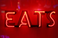<p>A neon light that reads ‘EATS’ forms part of an artwork exhibited in God’s Own Junkyard gallery and cafe in London, Britain, May 13, 2017. (Photo: Russell Boyce/Reuters) </p>
