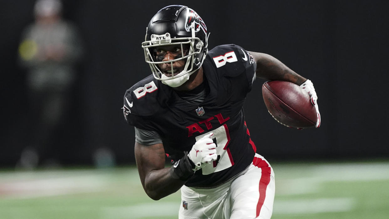 Atlanta Falcons tight end Kyle Pitts (8) runs after a catch during an NFL football game against the Carolina Panthers Sunday, Oct. 30, 2022 in Atlanta. (AP Photo/John Bazemore)