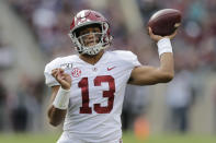Alabama quarterback Tua Tagovailoa (13) passes against Texas A&M during the second half of an NCAA college football game, Saturday, Oct. 12, 2019, in College Station, Texas. (AP Photo/Sam Craft)