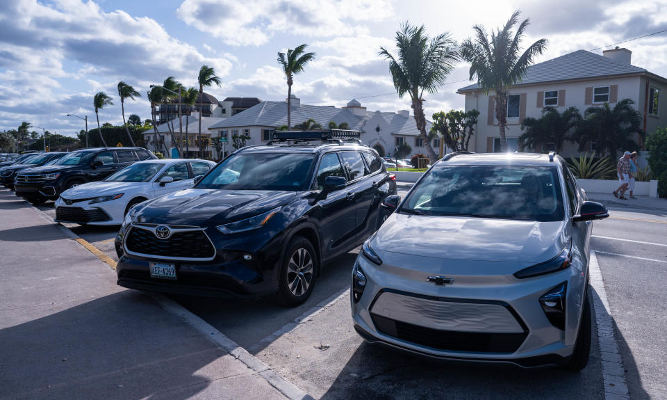 A 2023 Chevrolet Bolt EUV, right, is seen parked on the east side of Florida A1A on Tuesday, February 7, 2023, in Delray Beach, FL. Palm Beach Post reporter Hannah Morse drove the electric vehicle for a week to get a sense of the ease-of-use of electric vehicles in Palm Beach County.