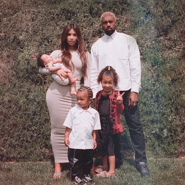 Kim Kardashian West attempted make a #relatable post on Instagram on Thursday recalling how hard it is to get a family photo with her three kids and husband Kanye West. Source: Instagram / kimkardashian