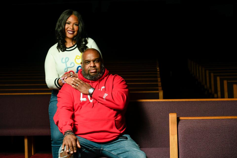 Pastor John Gray and wife, Aventer, pose for a portrait in the Love Story Church, formerly Relentless Church, sanctuary on Thursday, March 28, 2024.