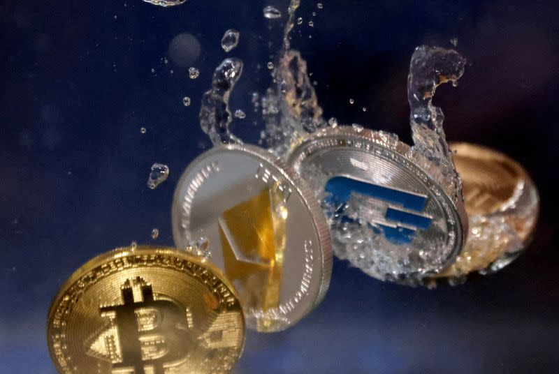 FILE PHOTO: Illustration shows representation of cryptocurrency Bitcoin, Ethereum and Dash plunging into water