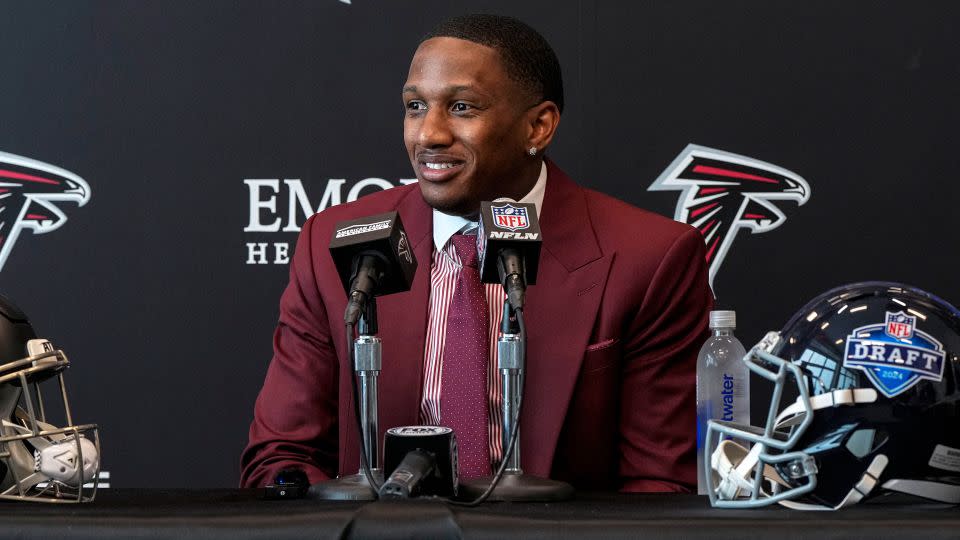 New Falcons quarterback Michael Penix Jr. talks to the media. - Dale Zanine/USA Today Sports/Reuters