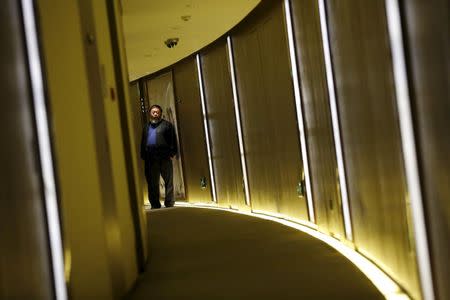 Dissident Chinese artist Ai Weiwei poses during an interview with Reuters at the hotel he is staying at in Beijing, March 24, 2015. REUTERS/Kim Kyung-Hoon