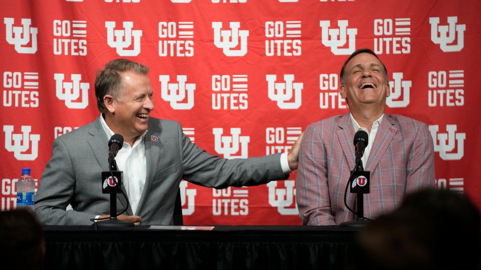 University of Utah President Taylor Randall, left, and Mark Harlan, Director of Athletics, University of Utah laugh during a news conference addressing the move from the Pac-12 Monday, Aug. 7, 2023, in Salt Lake City.