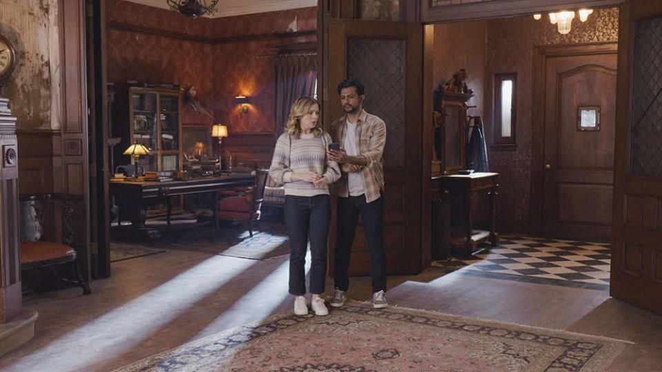 Rose McIver and Utkarsh Ambudkar on CBS’ supernatural comedy Ghost. - Credit: Courtesy of CBS