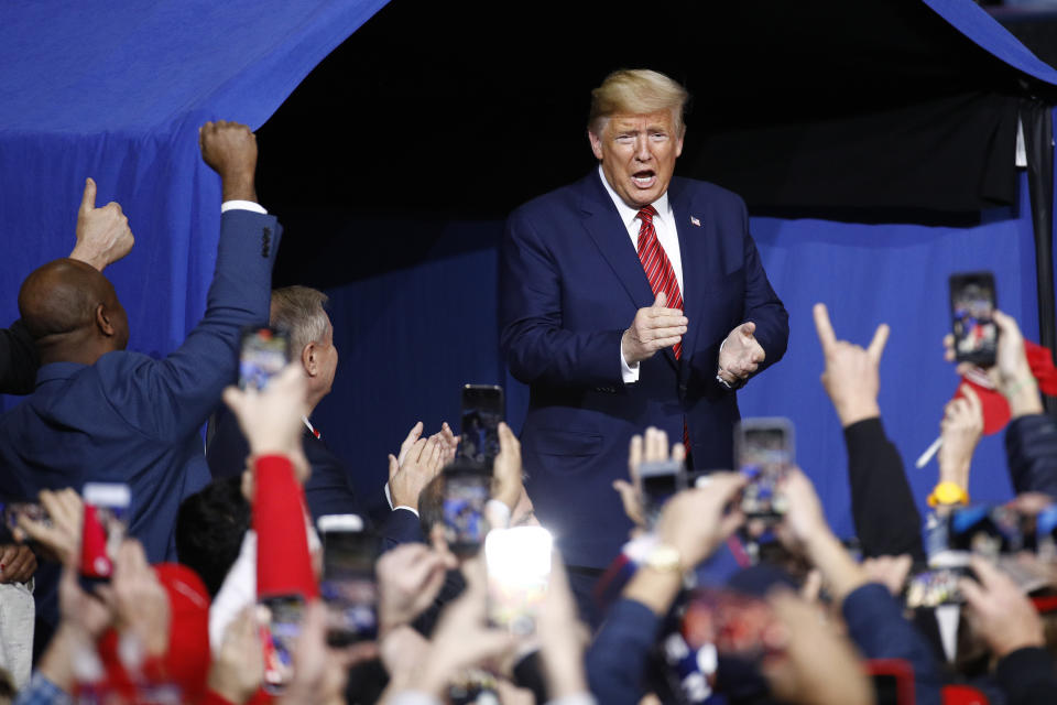 President Donald Trump walks onstage at a campaign rally, Friday, Feb. 28, 2020, in North Charleston, S.C. (AP Photo/Patrick Semansky)