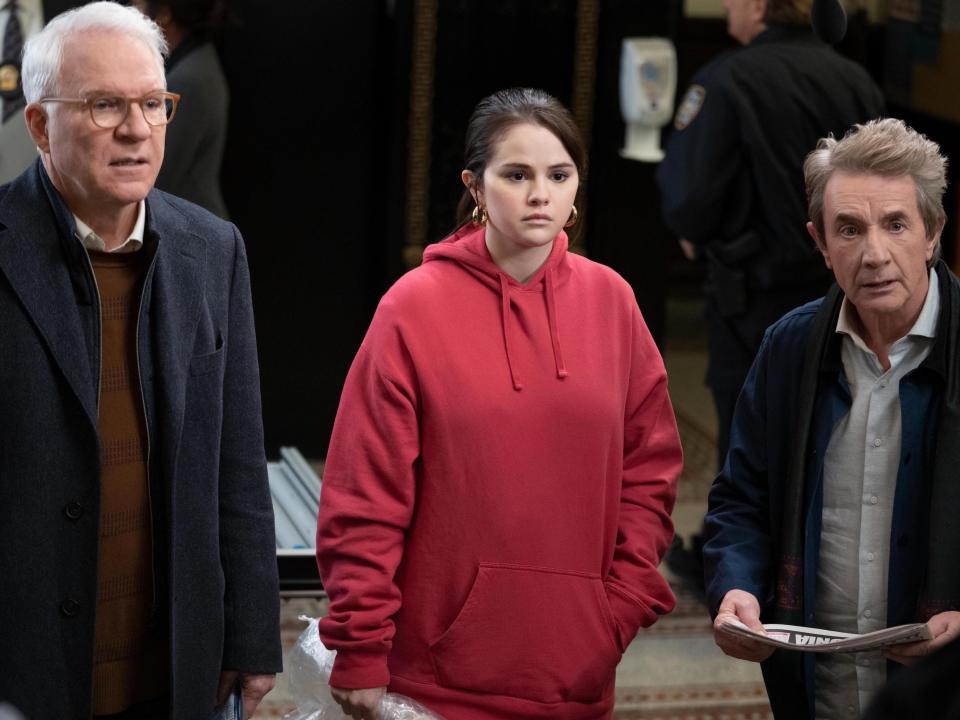 Charles, Mabel, and Oliver stand together in this still from season 2 of "Only Murders in the Building."