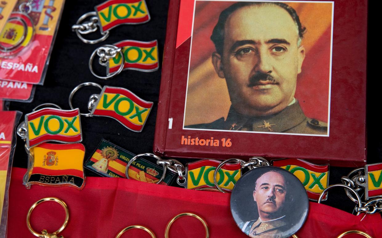 Souvenirs showing General Franco on sale at a Vox rally