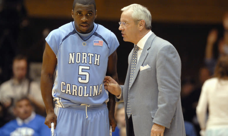 Former North Carolina point guard Ty Lawson with Roy Williams.