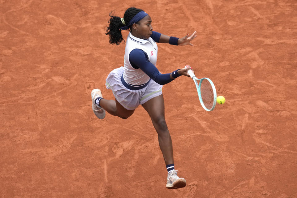 Coco Gauff of the U.S. plays a shot against Ukraine's Dayana Yastremska during their third round match of the French Open tennis tournament at the Roland Garros stadium in Paris, Friday, May 31, 2024. (AP Photo/Christophe Ena)