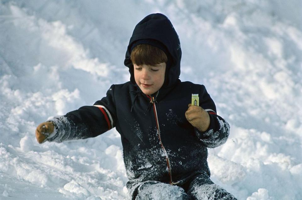 1966: John F. Kennedy Jr. plays in the snow