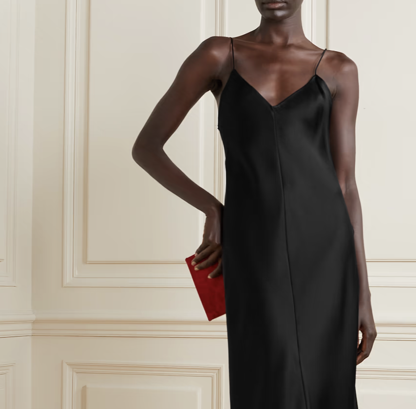 A model wearing The Row gown in black. 