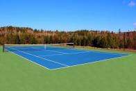 <p>Abony is an avid tennis player and owner of a professional tennis team in California. And the property, with its two tournament-quality outdoor courts and one stadium-quality indoor court, suits his tastes. (Keller Williams Capital Realty) </p>