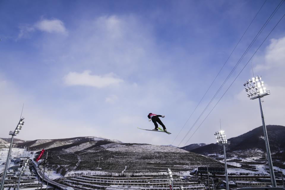 Yoshito Watabe, of Japan, soars through the air during the trial round of the individual Gundersen large hill/10km, ski jumping competition at the 2022 Winter Olympics, Tuesday, Feb. 15, 2022, in Zhangjiakou, China. (AP Photo/Matthias Schrader)