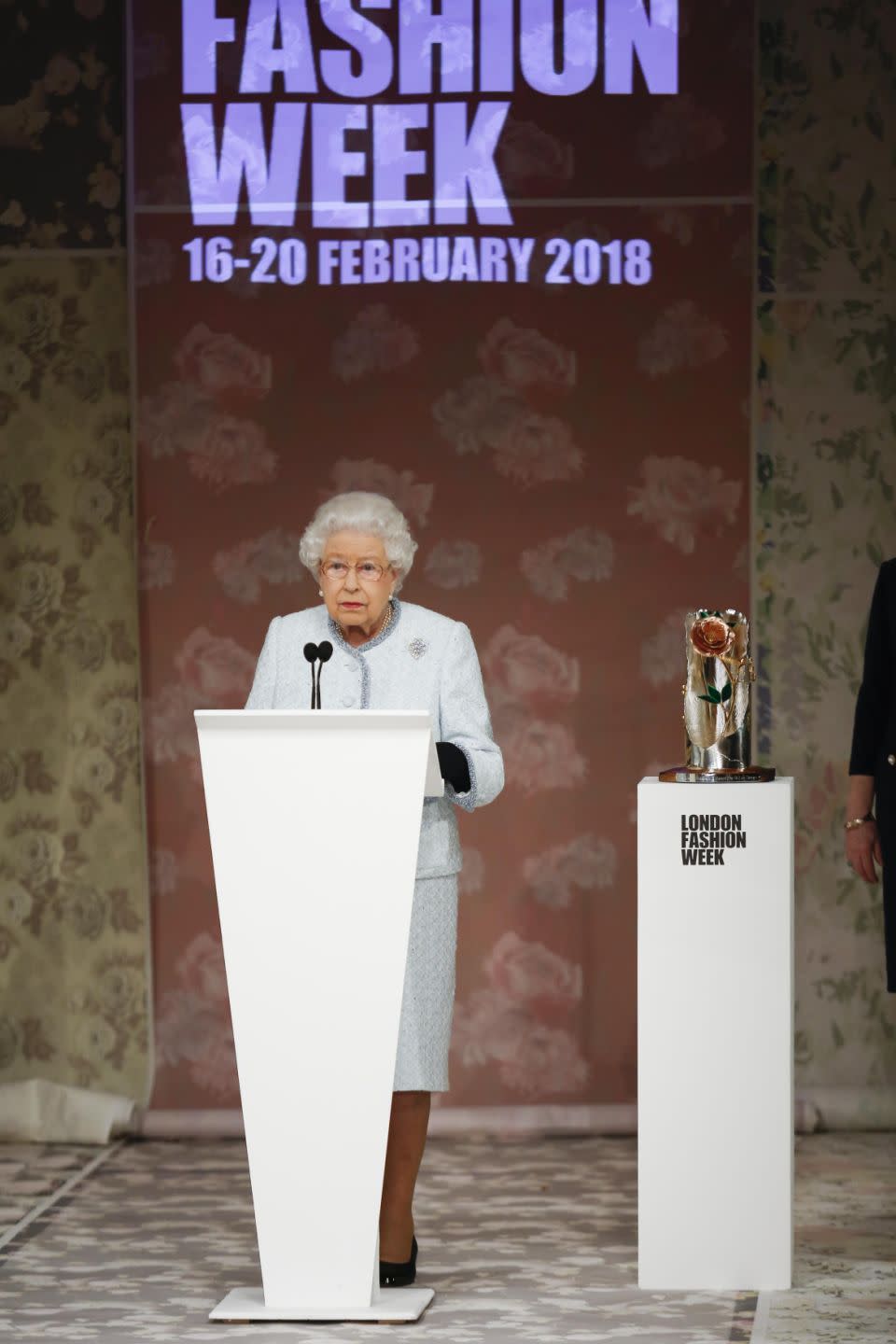 The Queen later presented an award to designer Richard Quinn. Photo: Getty