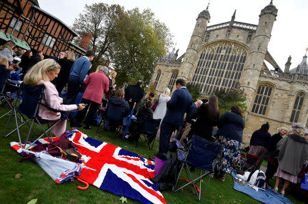 Guests wait for the royal wedding of Princess Eugenie and Jack Brooksbank in Windsor Castle, Windsor, Britain October 12, 2018. REUTERS/Toby Melville