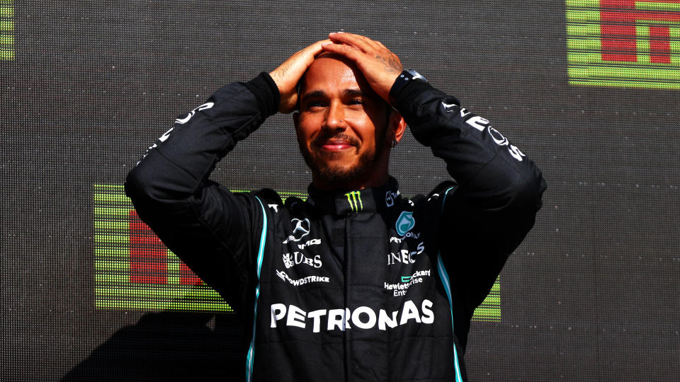 Race winner Lewis Hamilton of Great Britain and Mercedes GP celebrates on the podium during the F1 Grand Prix of Great Britain at Silverstone on July 18, 2021 in Northampton, England. / Credit: Dan Istitene - Formula 1/Formula 1 via Getty Images