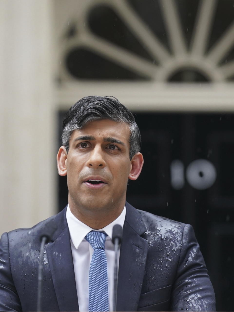 Britain's Prime Minister Rishi Sunak delivers a statement, outside 10 Downing Street, London, Wednesday, May 22, 2024. Sunak has set the date of July 4, 2024 for the national election to determine who governs the UK. (Stefan Rousseau/PA via AP)