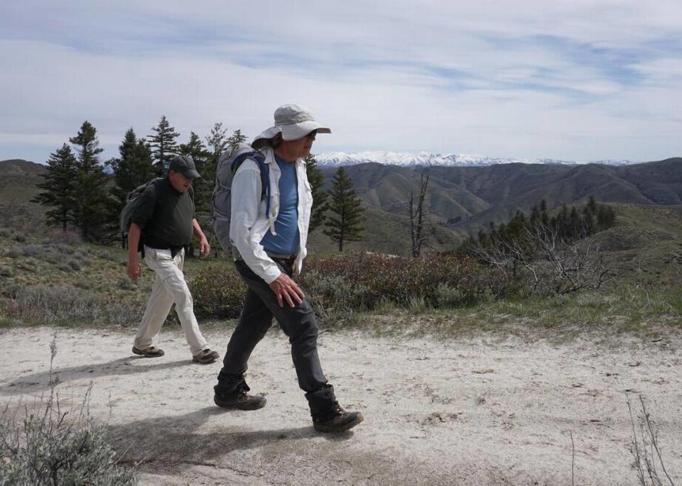 Tom Lopez of Boise, right, and Jon Fredland of Nampa walk along the ridge trail on a Kepros hike.