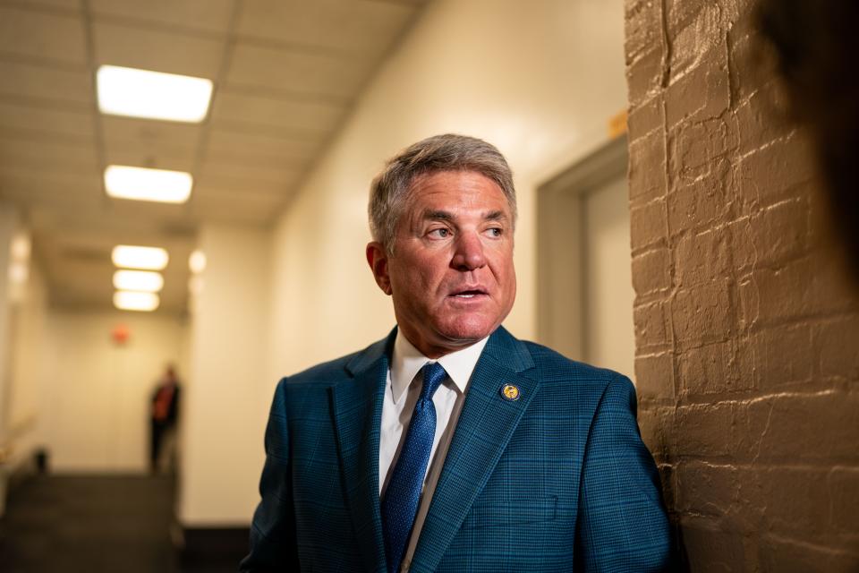 Rep. Michael McCaul, R-Texas, chats with reporters while arriving for a House Republican conference meeting on Capitol Hill on March, 6 2024 in Washington, DC.