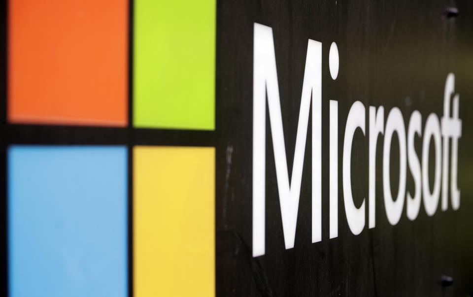 The Microsoft company logo is displayed at their offices in Sydney, Wednesday, Feb. 3, 2021. Microsoft says it supports Australia's plans to make the biggest digital platforms pay for news and would help small businesses transfer their advertising to Bing if Google quits the country. (AP Photo/Rick Rycroft)