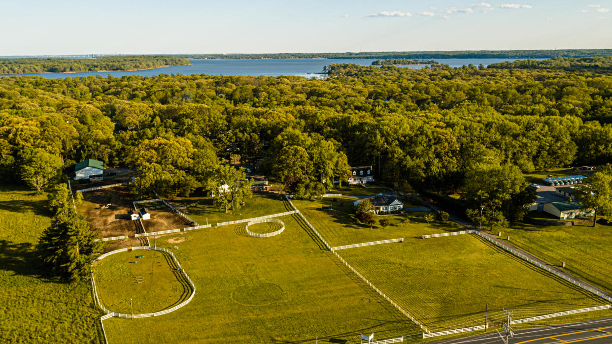 Aerial scenic view of the Chesapeake Bay in Pasadena, Maryland, on a warm evening in the springtime.