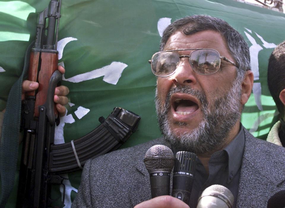 FILE - Hamas leader Abdel Aziz Rantisi, delivers a speech to supporters during a protest march in Gaza City against Israel and to show support for Palestinian fighters in the West Bank Friday March 1, 2002. Rantisi was killed by an Israeli airstrike in 2004. The benefits of such dramatic operations are symbolic achievement but often short-lived, bringing on further violence and equally formidable replacements as leaders of militant groups. (AP Photo/Adel Hana, File)