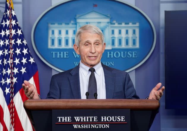 Dr. Anthony Fauci, at a White House press conference on Thursday, encouraged Americans to get vaccinated and booster shots to help prevent the virus's spread and severe disease. (Photo: Kevin Lamarque via Reuters)