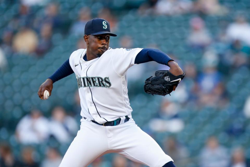 May 29, 2021; Seattle, Washington, USA; Seattle Mariners starting pitcher Justin Dunn (35) throws against the Texas Rangers during the first inning at T-Mobile Park.