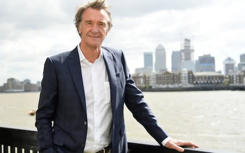 Jim Ratcliffe, CEO of British petrochemicals company INEOS, poses for a portrait with the Canary Wharf financial district seen behind, ahead of a news conference announcing the launch of a British America's Cup sailing team in London, Britain, April 26, 2018 - Credit: 2018