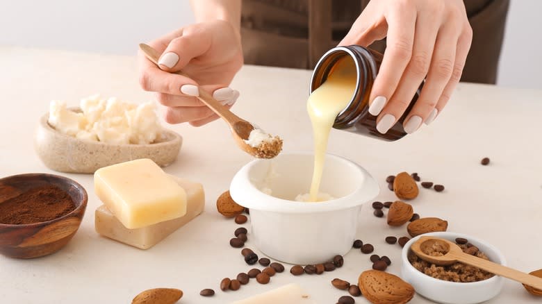 woman making natural soap