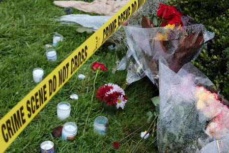 Flowers and candles are placed outside the Tree of Life synagogue following Saturday's shooting at the synagogue in Pittsburgh, Pennsylvania, U.S., October 28, 2018. REUTERS/Aaron Josefczyk