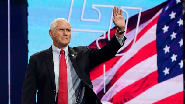 PHOTO: Former Vice President Mike Pence waves to the crowd as he prepares to addresses the convocation at Liberty University, on Sep. 14, 2022, in Lynchburg, Va. (Steve Helber/AP)