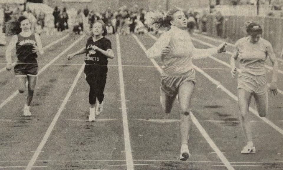 Tracy Randall of Hamlin beats teammate Tara Cyre to the finish line in the Class B girls' 100-meter dash during the 1991 Watoma Relays track and field meet in Watertown. Randall also anchored two winning relays and was named the Class B girls outstanding athlete in the meet.